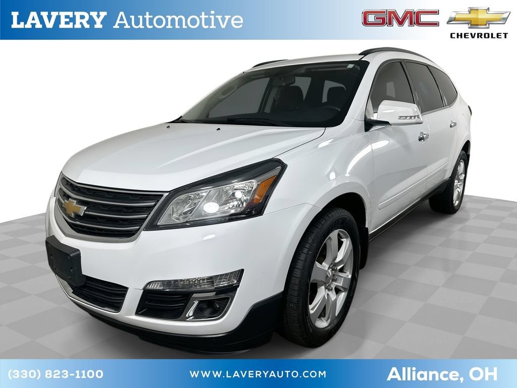 2016 Chevrolet Traverse LT in Summit White — front three-quarter view