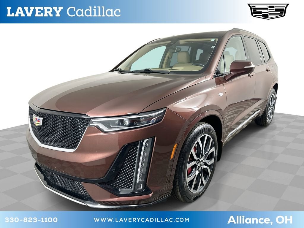 2023 Cadillac XT6 Sport in Rosewood Metallic — front three-quarter view